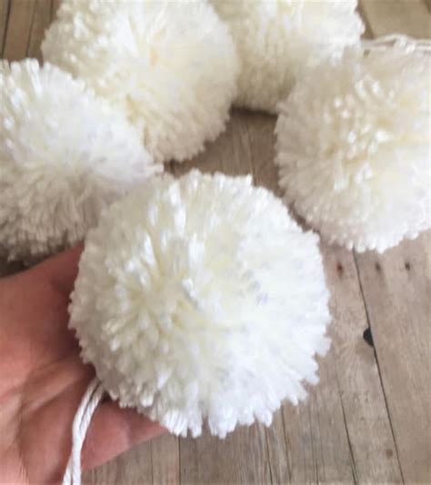 big white pom poms|More.